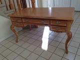 Attractive table with cabriole legs.