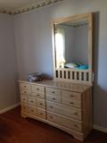 Dresser with mirror, goes with nightstand in previous frame.