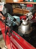 Soldering iron with clamp