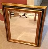 Beautiful Mirror with gold frame and black & gold inlay with beveled glass.  Great for over the dresser or hang on the wall in any room.  Minit condition.