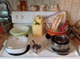 Very old McCoy cookie jar, nice kitchen items.  This house also have an assortment of vintage salt & pepper shakers.