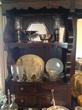 Beautiful Sterling Silver in this house along with vintage glass pitcher and matching tea glasses right out of the 50's. All sitting in this very nice rustic hutch.  Gorgeous piece.