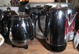 Chrome coffee and tea pots.
