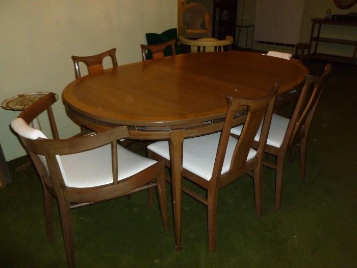 Cool Mid-Century Dining Room Set..table has 2 leaves, and the chairs are killer! The China cab. is unique..has sliding doors