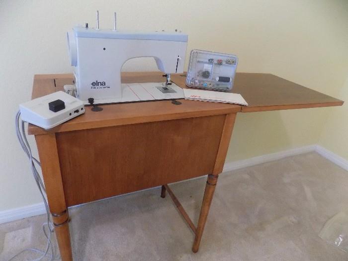 Elna sewing machine with cabinet