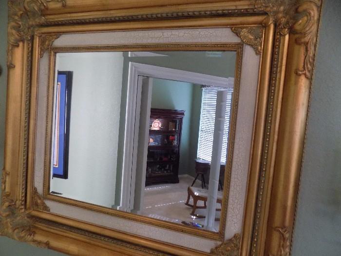 gilt framed beveled mirror