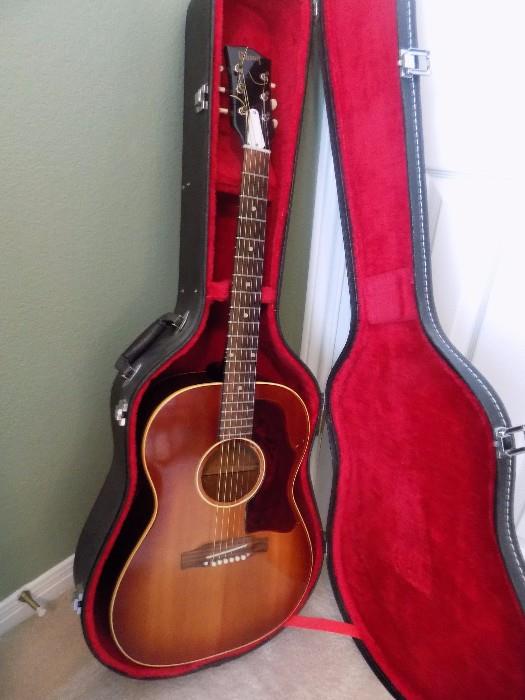 Gibson acoustic guitar and case