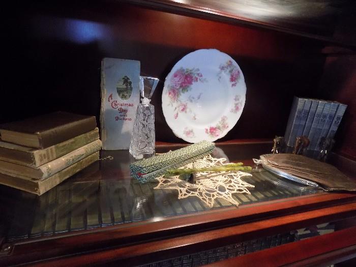jade chopsticks, books, crystal fragrance bottle