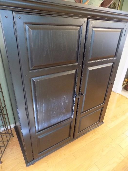 ebony entertainment armoire...can fit wide screen tv