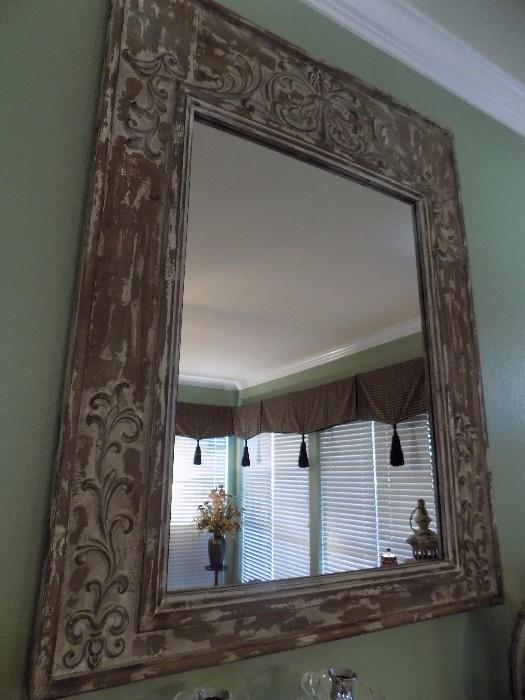large carved wood mirror