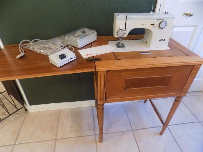 Elna sewing maching and cabinet