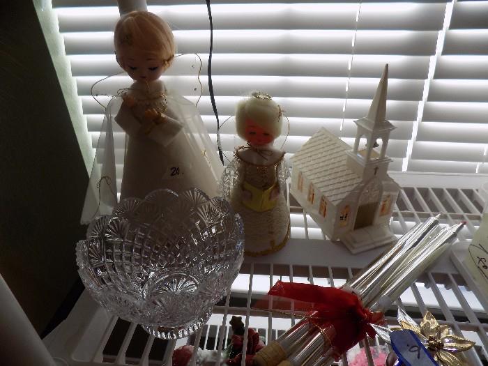 vintage angels, plastic lighted church, crystal bowl, and mercury glass candles