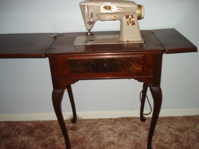 Singer sewing machine with cabinet.  Singer 500A Slant-o-matic Rocketeer.