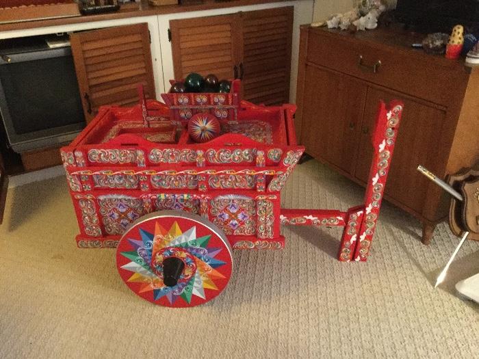large festive cart, hand painted with a smaller version on the top, has multiple trays inside, was used for knitting and sewing supplies, 