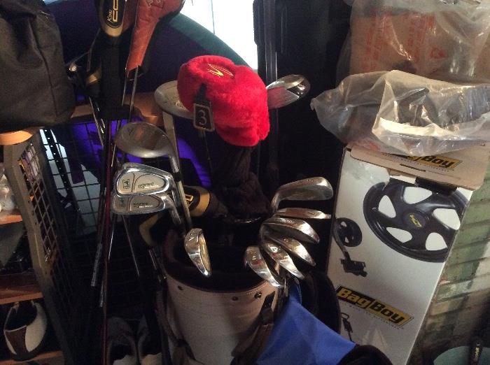 There is sooooooo much golf equipment! Clubs, bags, air