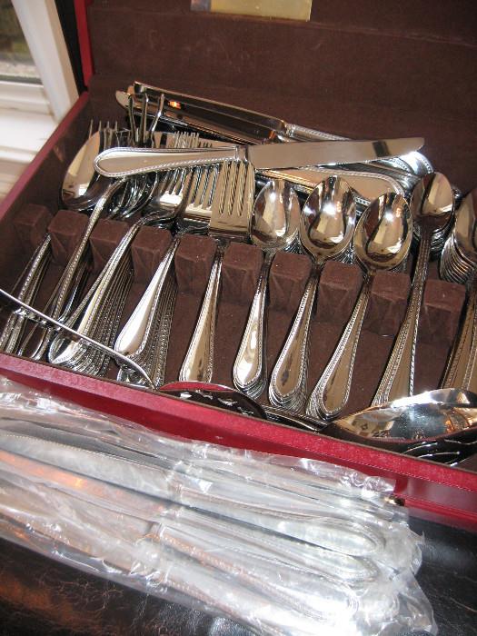 Brand new Reed and Barton select stainless flatware 