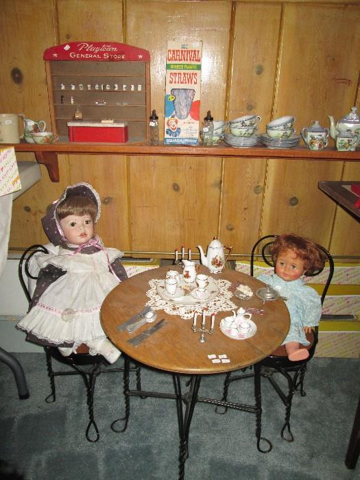 Doll size Ice Cream Parlor Set, tea sets, and a doll sized General Store on the shelf!