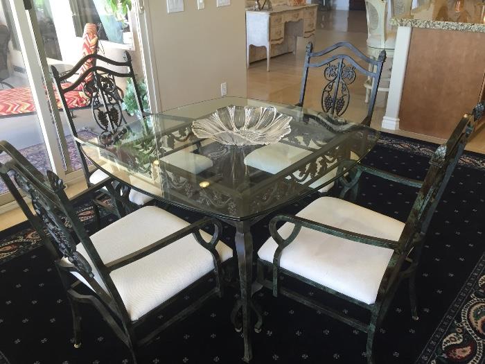 Glass top Iron table and 4 chairs