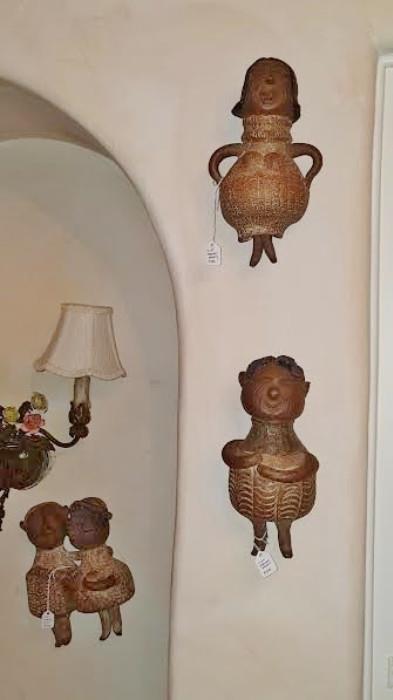 Collection of Clay Wall Figurines by Cliff Stewart