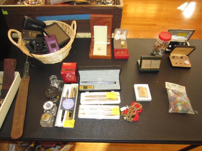 vintage writing instruments and inkwells.  cell phones, jewelry, vintage travel clock
