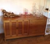 Matching Bernhardt sideboard - 58" long.  With racy gilt nude sculpture, fun pitcher & glasses set, heavy crystal vases & pitcher