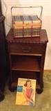 Mahogany nightstand with vintage sewing basket & Vogue pattern book
