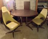 1970's kitchen table & 3 chartreuse vinyl swivel chairs 