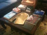 great asian inspired coffee table with beveled glass panels, lots of great coffee table books on decorating, antiques, gardening, travel, cooking, history, much more!