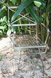 Pair of very cool metal garden chairs.