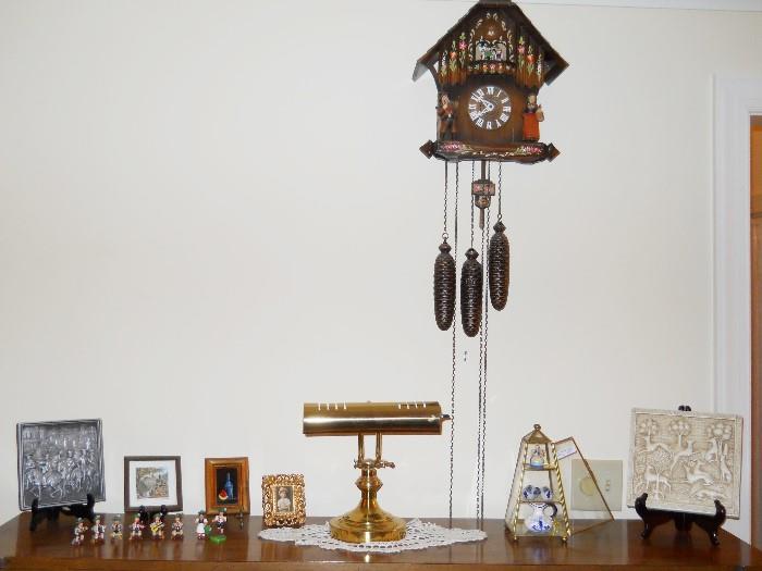 coo coo clock, piano lamp, framed pieces, Delft, etc.
