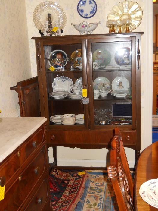 vintage china cabinet,  collector plates, Wedgwood china, Herend, Karman style rug, prayer rug, Hamadan rug, etc.