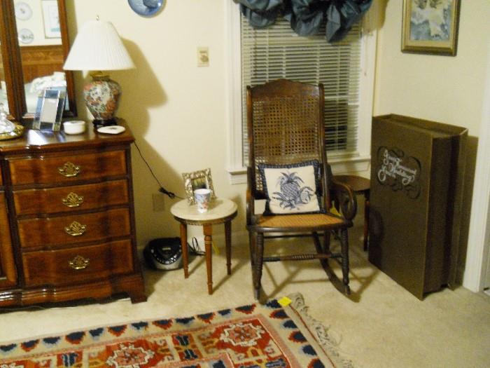 wedding gown, vintage rocking chair, round marble top table, etc.
