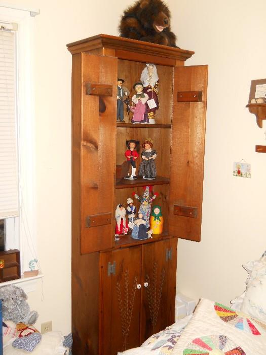 cabinet, dolls, etc.