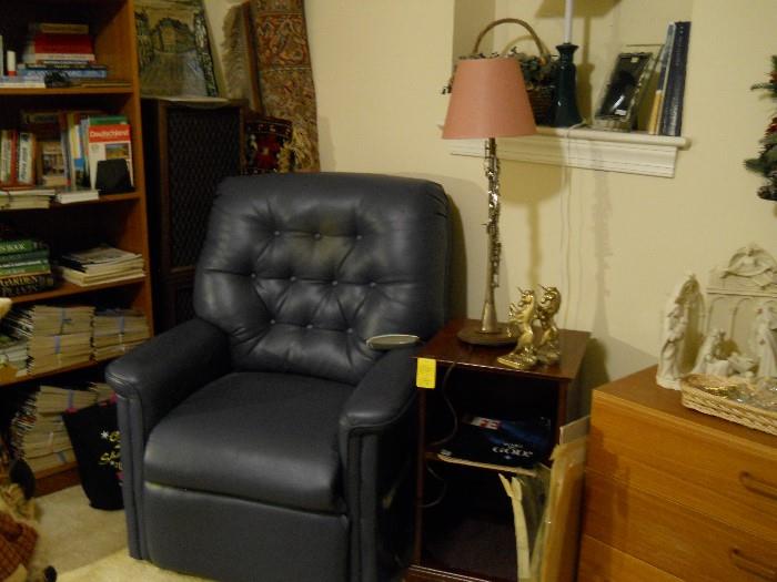 Pride lift chair, mahogany end table, musical instrument lamp, bookcase, books, rugs, etc.