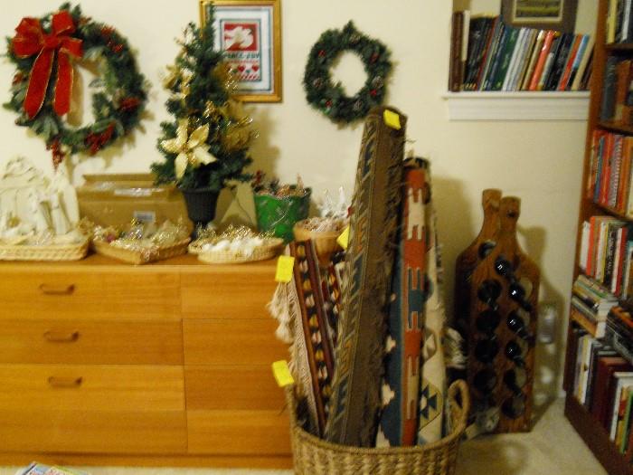 flat weave rugs, dresser, holiday items, books, bookcase, etc.