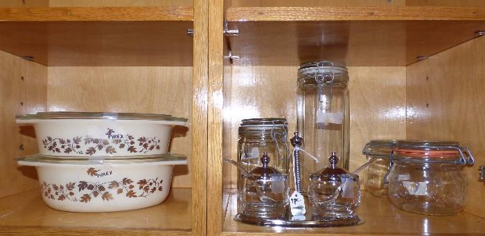 Pyrex covered casserole dishes, glass storage jars