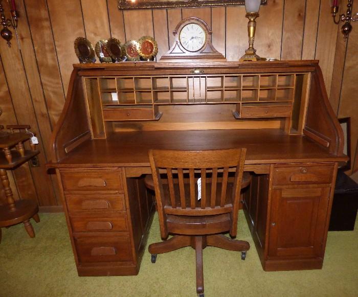 Antique roll-top desk found in Americus, Ga. with matching rolling desk chair
