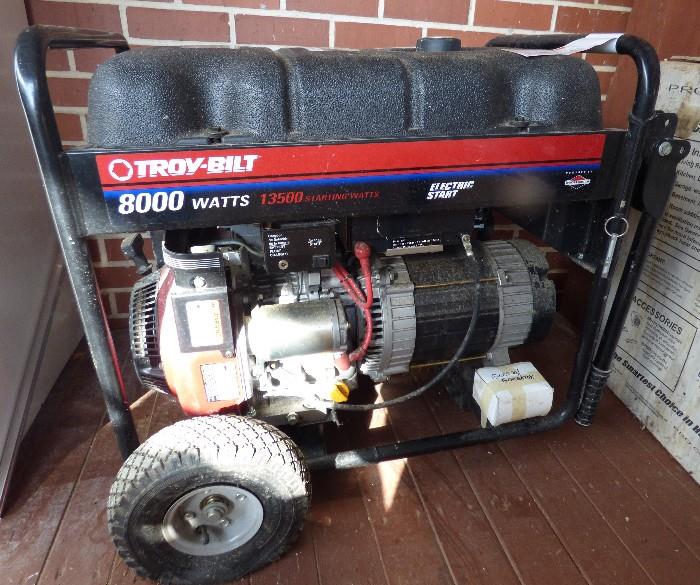 Troy-bilt 8000 watts, 13500 starting watts, electric start.  Only used ONE TIME just to test it out !!!