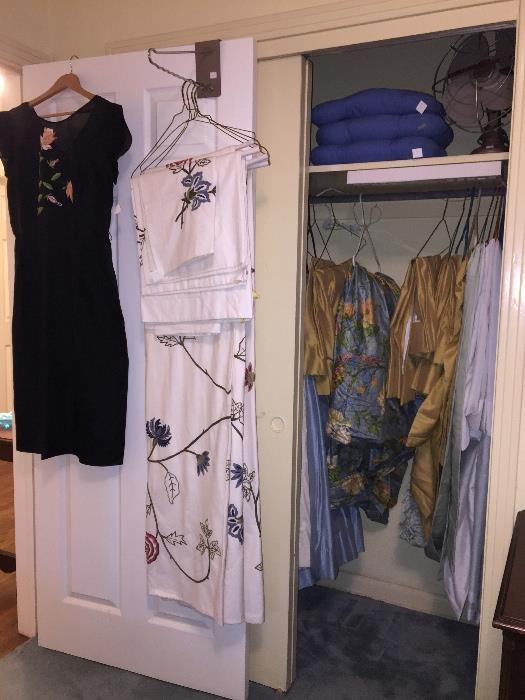 Drapes in the closet - Vintage Dress on the door -  Pottery Barn Queen Duvet with Shams and Pillow Cases on the door as well 