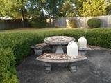 Very nice patio table and pottery jugs.  YOU MUST BRING ASSISTANCE TO MOVE THIS ITEM - HELP IS NOT AVAILABLE.