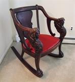 C/1900 Mahogany Victorian Rocker w/carved winged heads and claw feet