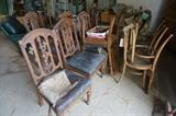 Several sets of dining room chairs.