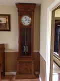 Waterbury Grandfather time only clock with double tube mercury pendulum. Overall height is 96 ". Offered at $6,000. Bids will be considered. See additional photos.