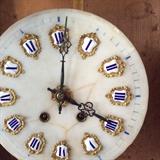 Cloissone embellished marble dial