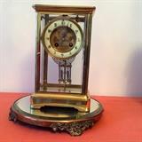 French clock on mirrored base. See additional photos for pricing.