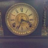 Ingraham mantel 8 day time and strike with gong coil. Bezel is 5.5", case 17.5" x 11" height, 7.5" depth. Adrian model. Offered at $250. Bids will be considered. 