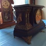 Adrian model Ingraham mantel side view. 