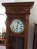 Waterbury time only 8 day grandfather of 96" height. Plinth is 27.5"  in width and 25" tall. Offered at $6000. Bids will be considered. 