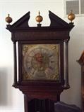 Joseph Thomas tall case carved door  90" time and strike grandfather clock,  circa 1773. Extremely rare hand carved case, known to have been produced 1760-1790 only. Brass dial is 12" and is pre 1800's. Finials original as well. Carvings on door are thought to depict the castle wall of early Chester England.  Offered at $6000. Bids will be considered. 