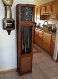 Mid-century modern granddaughter style time chime and strike floor clock.Taller than traditional granddaughter clocks, this one is 65" in height. Offered at $750. Bids will be considered. 